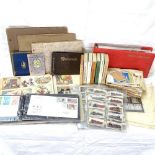 Various loose postage stamps, cigarette cards and reference books