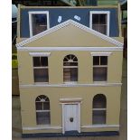 A painted plywood doll's house, height 53cm