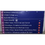 An enamelled bus sign for Enfield Town, Brimsdown, Edmonton, Tottenham and Bush Hill Park etc