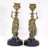 A pair of cast-brass figure candlesticks on marble plinths, height 22cm