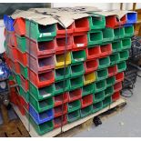 A large quantity of plastic workshop containers