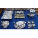 A collection of silver plated items, to include teapot, embossed swing-handled tray, egg cup set etc