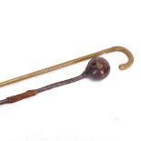 A Zulu hardwood knobkerry with animal fur fringe, and a walking stick, knobkerry length 65cm (2)