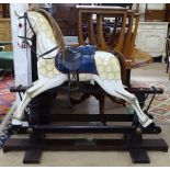 A special Millennium limited edition rocking horse, with brass plaque to mark year 2000, serial