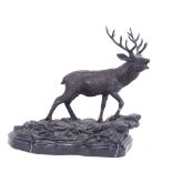 After Mene, patinated bronze sculpture, stag on rocky outcrop, signed, on black marble base, base