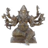 An Eastern Buddhist cast-brass Ganesh figure, height 17cm