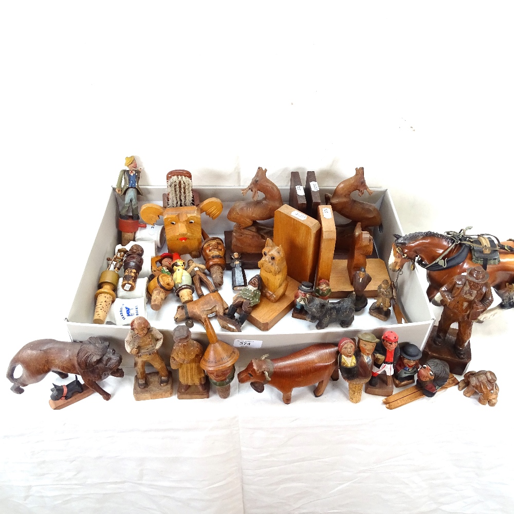 Various Tyrolean wood carvings, including moving wine corks, bookends etc