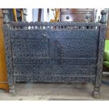 An Antique Korean marriage chest, with all over chip carved decoration, W110cm, H101cm, D59cm