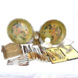 Pair of Art Nouveau painted tin display plates, silver-handled knives, carved alabaster sculpture