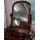 A 19th century mahogany arch-top swing toilet mirror