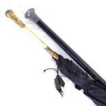 A silver-topped ebony walking cane, and a Victorian parasol with inscribed gilt-metal mounts,