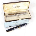 A cased Sheaffer fountain and ballpoint pen set, and a Watermans 502 fountain pen, boxed (3)