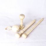 Various ivory carvings, including large desk seal, parasol handles, and baby's rattle, seal length