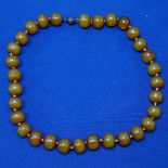 A simulated amber bead necklace