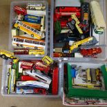 A large collection of various diecast and tinplate toys, including Matchbox, Corgi, and Days Gone By