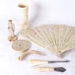 Various ivory and bone items, circa 1900, including dice shaker, fan etc