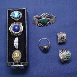 8 various silver and stone set rings, and a silver and stone set brooch