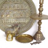 Various Eastern brass, including large circular embossed tray, large temple candlestick, temple bell