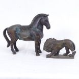 A heavy cast-brass horse and lion, horse length 17cm (2)