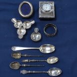 A group of silver and white metal items, to include oval photo frame, a Georgian teaspoon, mote