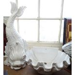 A large white painted ceramic dolphin water fountain spout and matching clam shell basin, dolphin