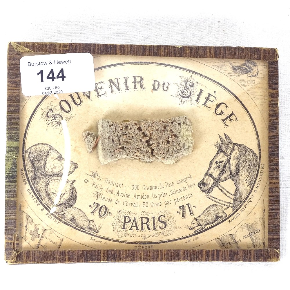 A Souvenir Du Siege, containing a ration of bread made from oats, starch, sawdust and horsemeat -