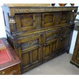 An Ipswich oak carved and panelled Court cupboard, width 5'7", height 4'6"