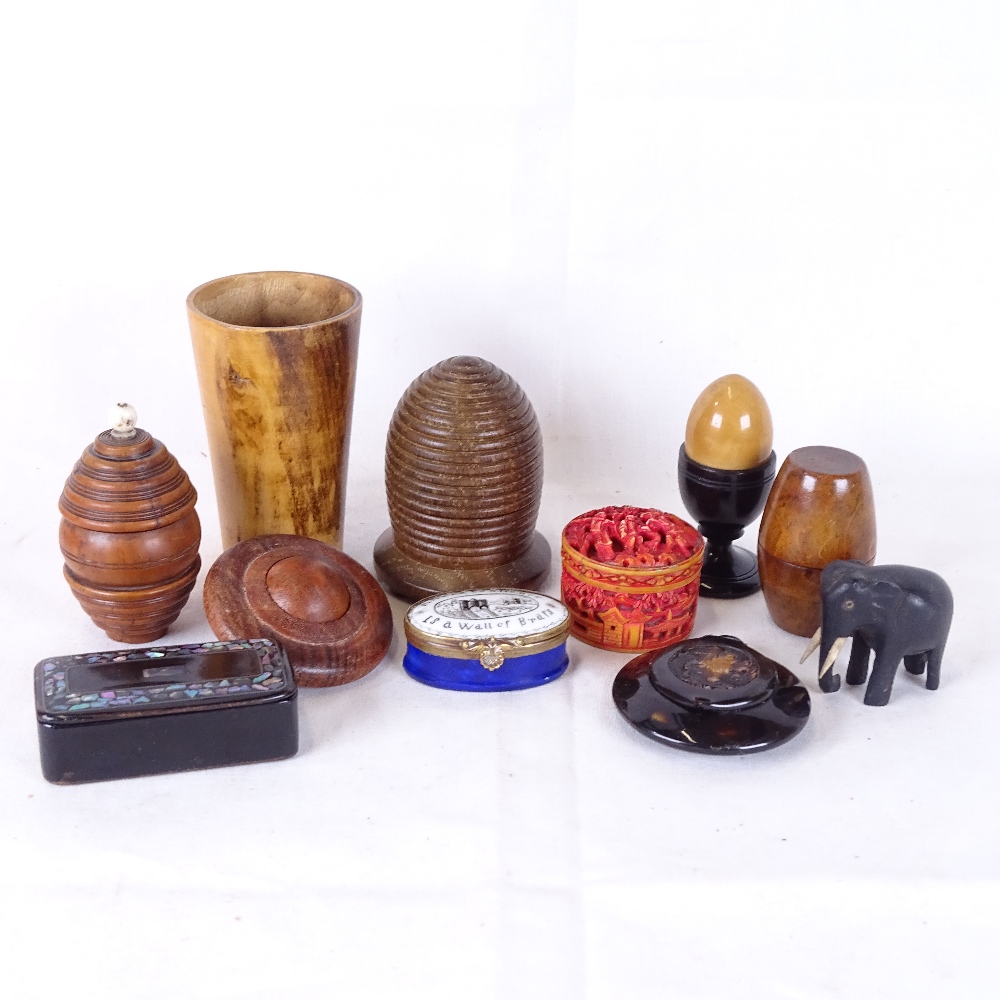 Various boxes and carvings, including red stained ivory box, barrel-shaped nutmeg grater, beehive-