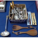 A box of mixed cutlery, including salad servers