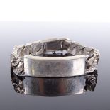 A heavy silver flat curb-link bracelet, textured settings with central name plate, maker's marks JP,