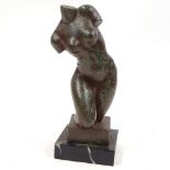A green patinated bronze female nude torso, signed Tew, mounted on black marble plinth, overall
