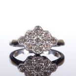 An 18ct white gold diamond cluster lozenge ring, total diamond content approx 1ct, setting height