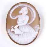 A relief carved cameo shell panel brooch, depicting Hebe - the Greek Goddess of Youth, in unmarked