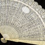 A Chinese relief carved ivory Brise fan, late 18th/early 19th century, with details floral