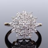 A 9ct gold diamond cluster snowflake ring, total diamond content approx 1ct, maker's marks DK,