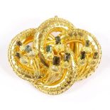 A Victorian unmarked gold emerald? knot memorial brooch, cannetille decoration with vacant panel