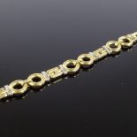 An Italian 18ct white and yellow gold hoop and gatelink bracelet, bracelet length 20cm, 22.6g Very