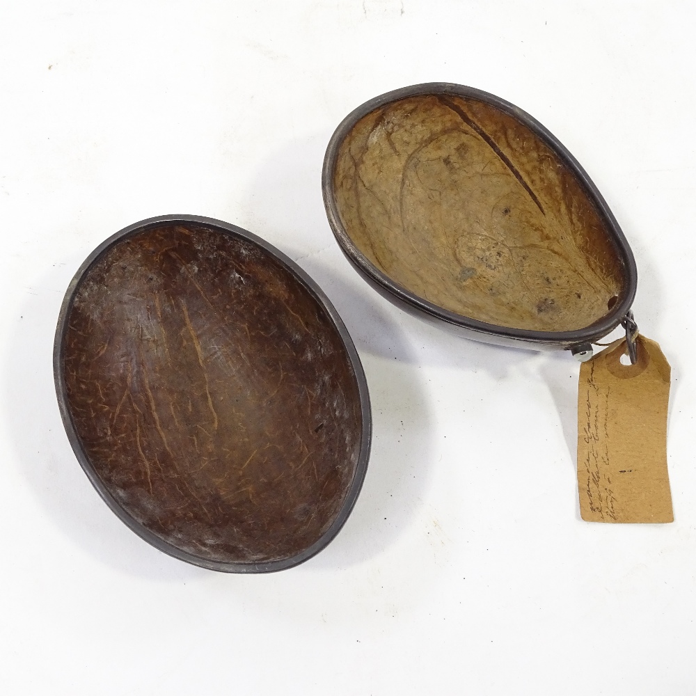 2 19th century polished coconut shells with unmarked white metal mounts, one bearing an old - Image 2 of 3