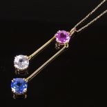 An unmarked gold pink white and blue synthetic sapphire negligee pendant necklace, on 9ct trace
