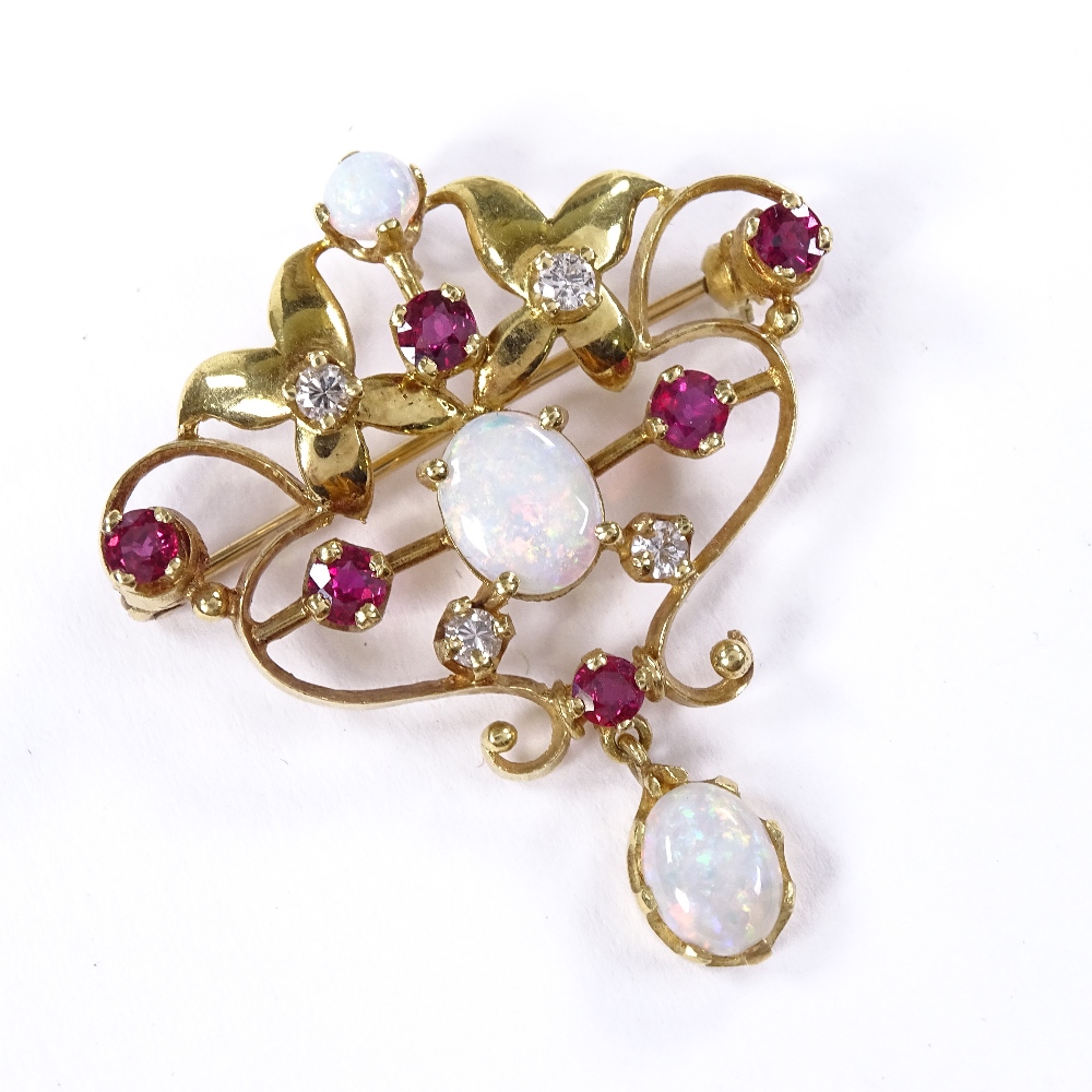 An Art Nouveau style 18ct gold opal, ruby and diamond pendant / brooch, pierced scrollwork settings, - Image 3 of 4