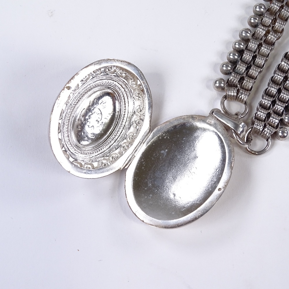 A sterling silver locket necklace, on silver bead collar chain, locket with relief embossed - Image 3 of 4