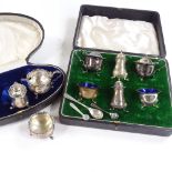 2 cased silver cruet sets Both in good overall condition, original spoons missing but blue glass