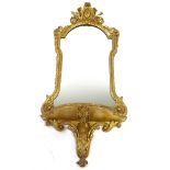 A 19th century gilt-gesso framed wall mirror with shelf below, overall height 1.1m, shelf width 50cm