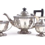 An Arts and Crafts heavy gauge 3-piece silver tea set, comprising teapot, sugar bowl and cream