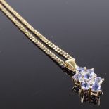 A 9ct gold iolite and diamond pendant necklace, on 9ct flat curb link chain, pendant height