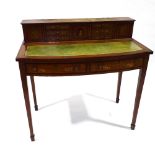 An Edwardian satinwood and rosewood crossbanded writing desk, with painted decoration, width 94cm