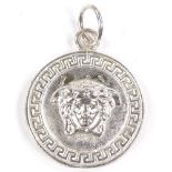 VERSACE - a sterling silver Medusa head pendant, Greek Key surround, pendant diameter 24.9mm, 12.