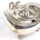 A George III silver condiment pot, bulbous squat form with shell thumbpiece, blue glass liner and