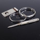Various silver, including hinged bangles, cigar cutter and fruit knife (4) All in good overall