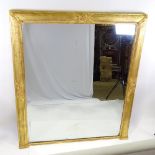 A large 19th century carved giltwood and gesso wall mirror, height 1.62m, width 1.42m